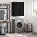 Der Wandschrank misst 69.5 x 34 x 90 cm in Schwarz